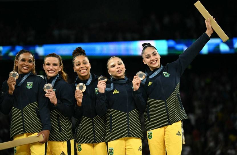 Essa premiação varia conforme o tier (ouro, prata ou bronze) e conforme o número de atletas da equipe vencedora. Foto: Getty Images